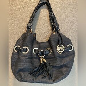Michael Kors, black leather purse, gold rivets, braided handles, embellishments